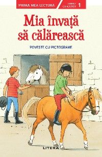 Mia învață să călărească
